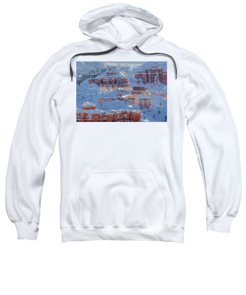  Sweatshirt featuring the photograph Glowing Bryce Canyon Spires In Snow by Alex Mironyuk