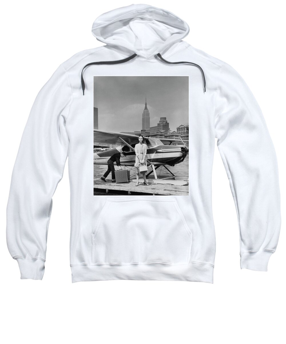Accessories Sweatshirt featuring the photograph Woman by a Seaplane by John Rawlings