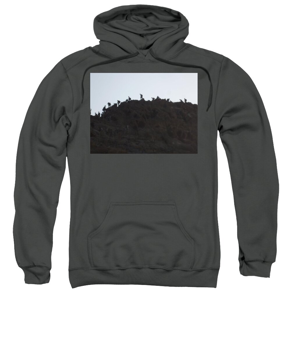 Mountain Sweatshirt featuring the photograph A Line of People Walking on a Mountain by Shea Holliman