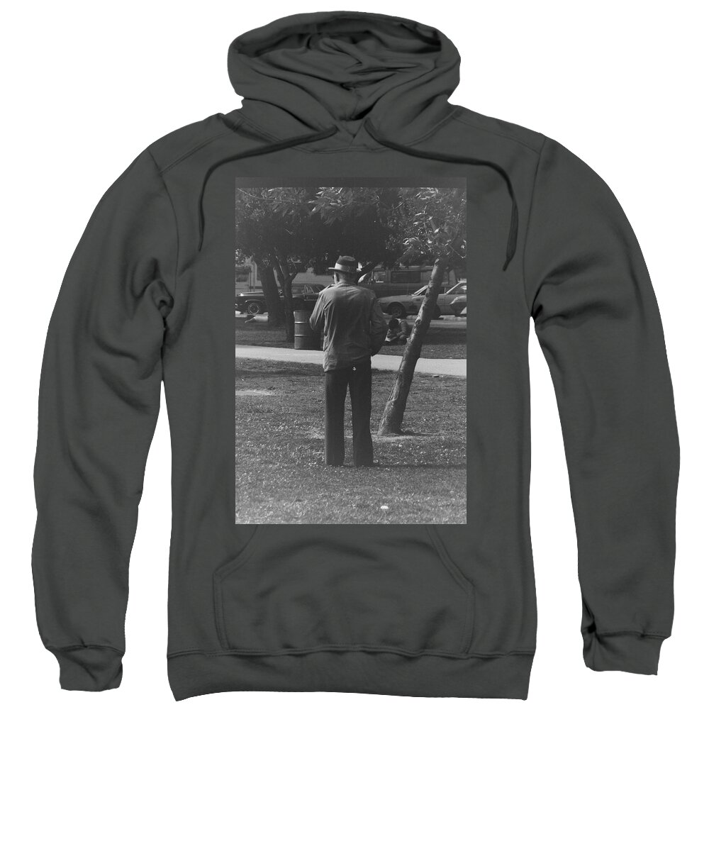 Senior Sweatshirt featuring the photograph Man in park by Karl Rose