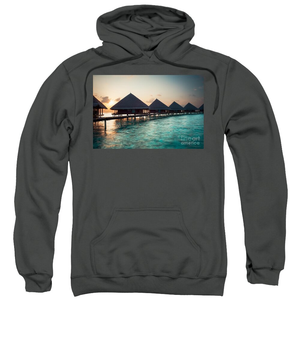 Amazing Sweatshirt featuring the photograph Waterbungalows At Sunset by Hannes Cmarits