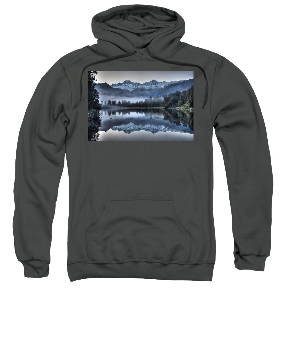 00446712 Sweatshirt featuring the photograph Lake Matheson In Predawn Winter Light by Colin Monteath