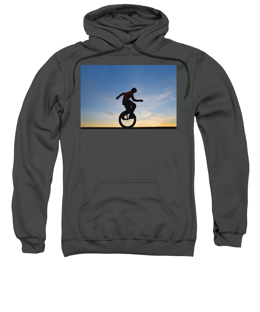 Adults Sweatshirt featuring the photograph Man On Unicycle by Deddeda