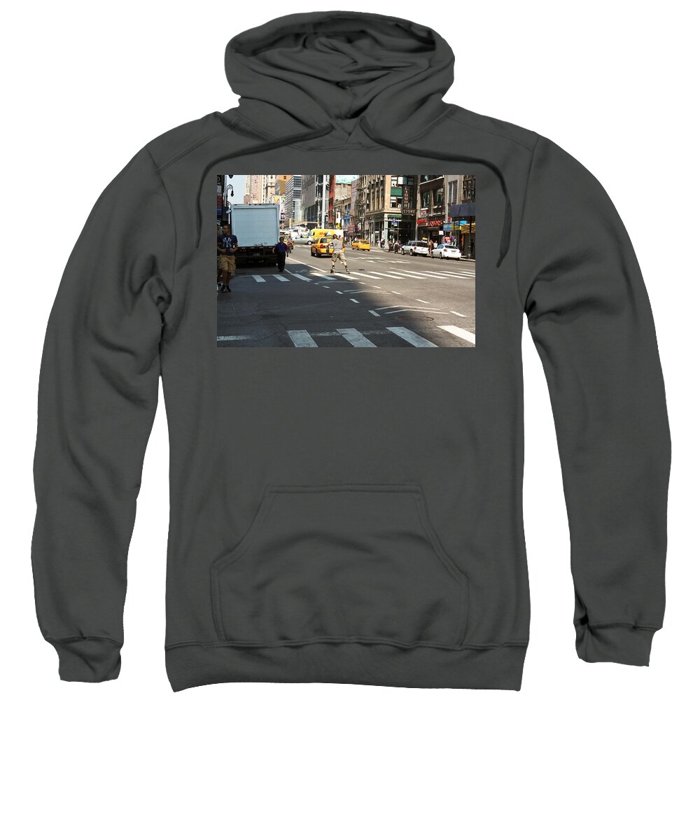 New York Sweatshirt featuring the photograph Skater Catching a Cab in Manhattan by Ann Murphy