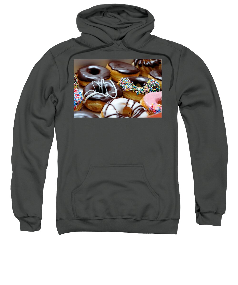 Breakfast Sweatshirt featuring the photograph Assorted Doughnuts Close-Up Picture by Paul Velgos