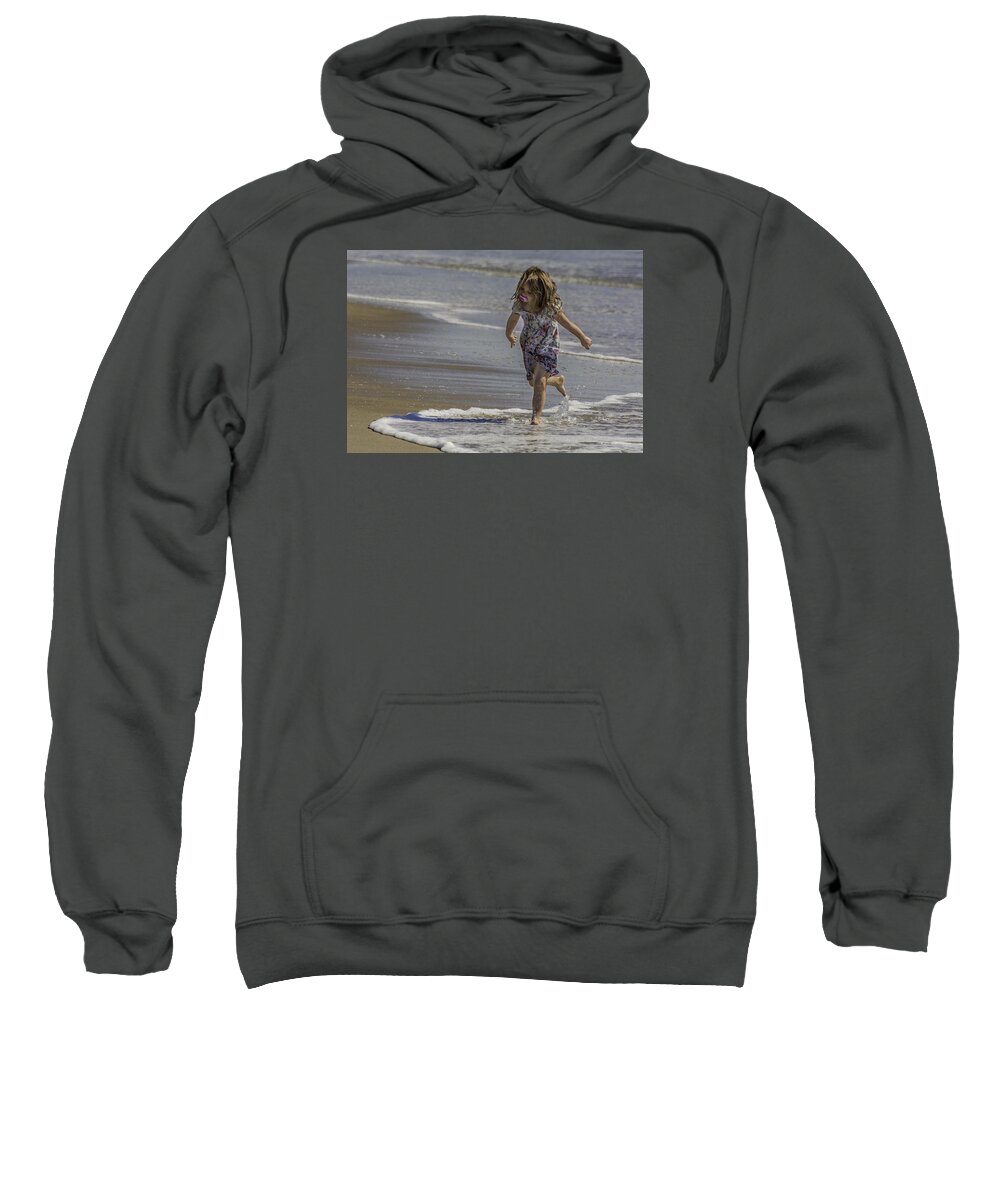 Dancing Sweatshirt featuring the photograph Dancing in the surf with a pink pacifier by WAZgriffin Digital