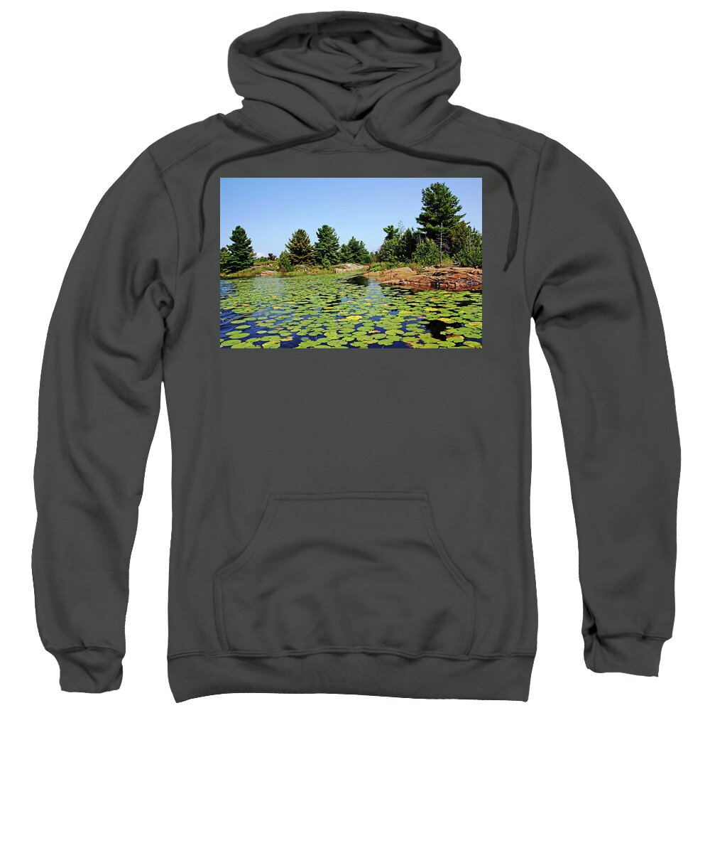 French River Sweatshirt featuring the photograph Lily Pads In The Shallows French River Delta by Debbie Oppermann