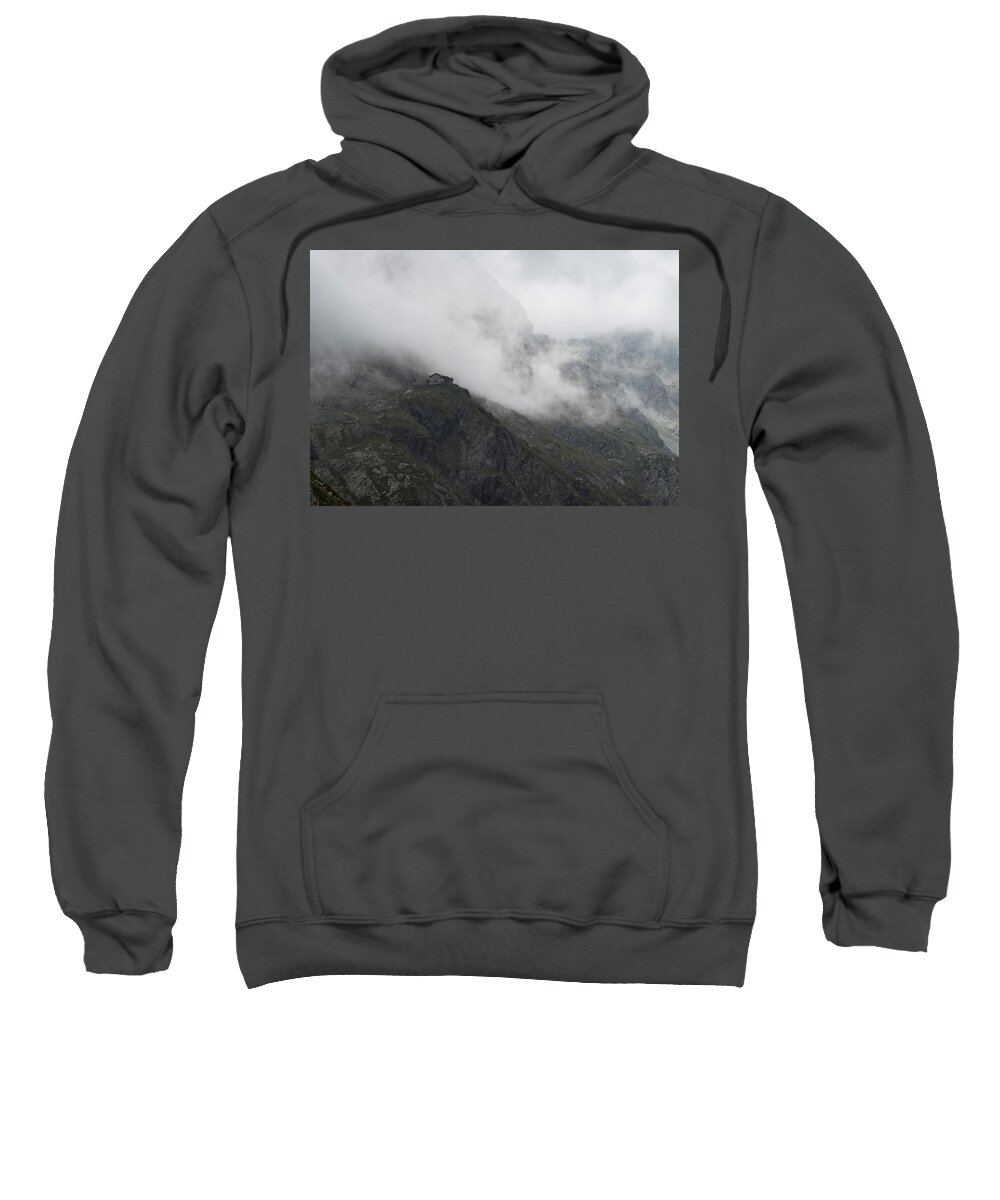 Mountain Sweatshirt featuring the photograph Mountain refuge in the clouds by Nicola Aristolao