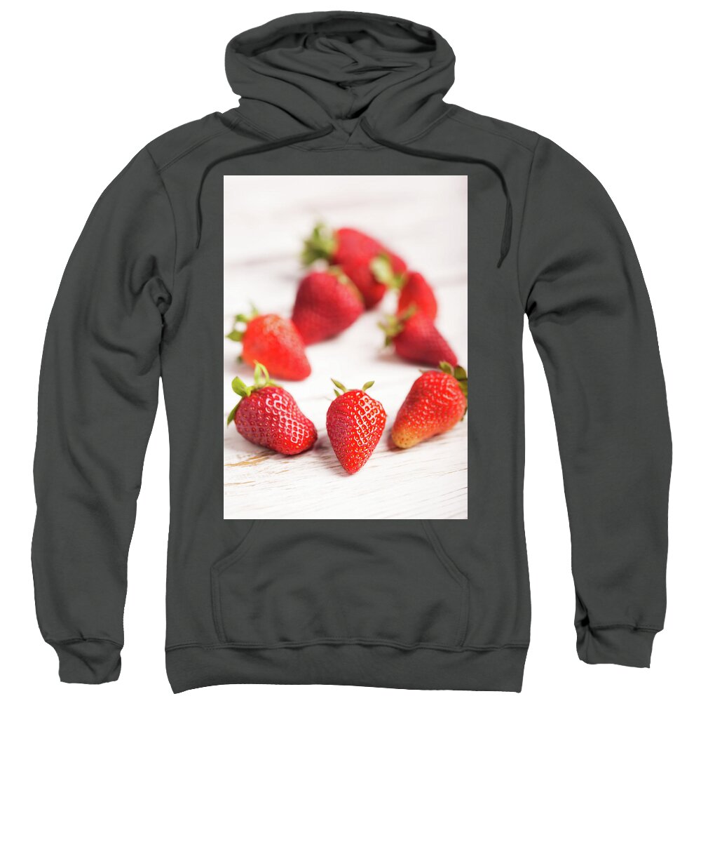 Vadim Goodwill Sweatshirt featuring the photograph Strawberries on the wooden background by Vadim Goodwill