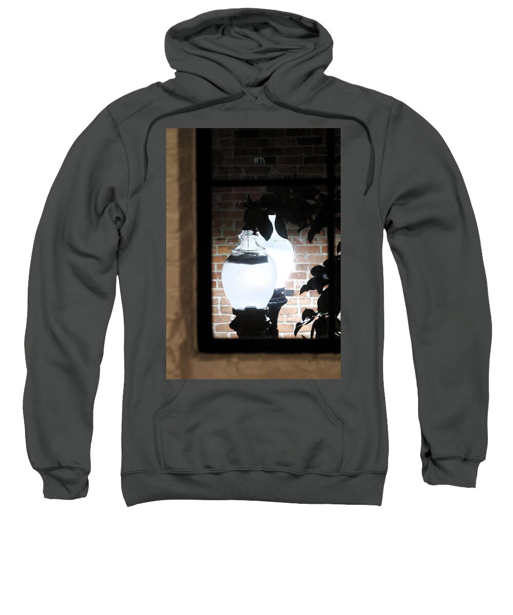 Street Light Through Window Sweatshirt featuring the photograph Street Light Through Window by Viktor Savchenko