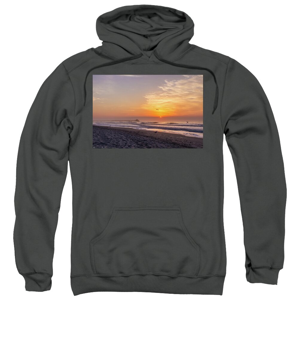 Sunrise Sweatshirt featuring the photograph Sunrise Over Cherry Grove Pier by Scott Kwiecinski