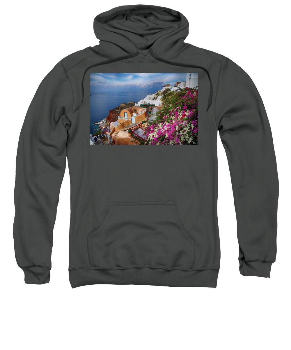 Greek Sweatshirt featuring the photograph Bright colored flowers spill over the walls by Steve Estvanik