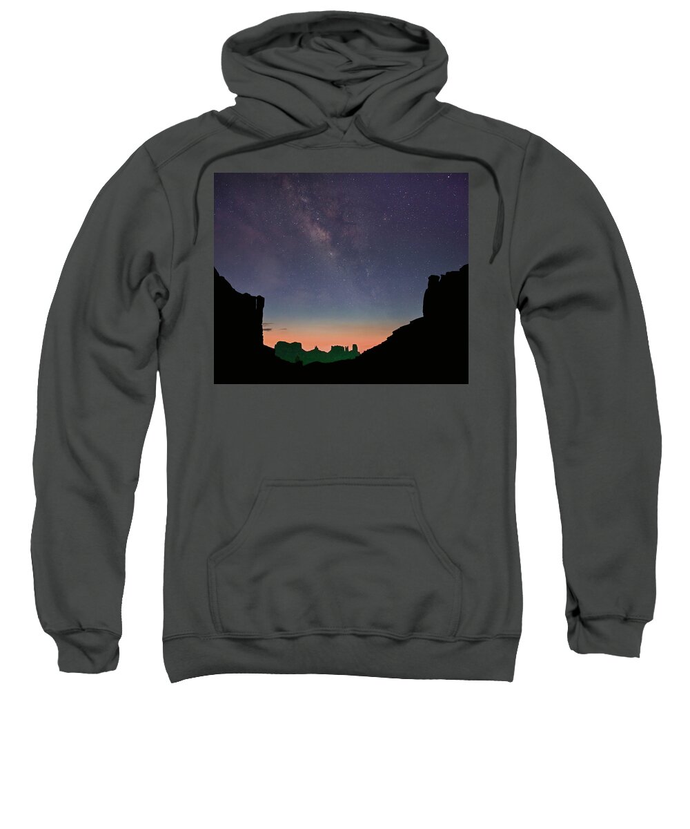 00555607 Sweatshirt featuring the photograph Milky Way Over Monument Valley, Arizona by Tim Fitzharris