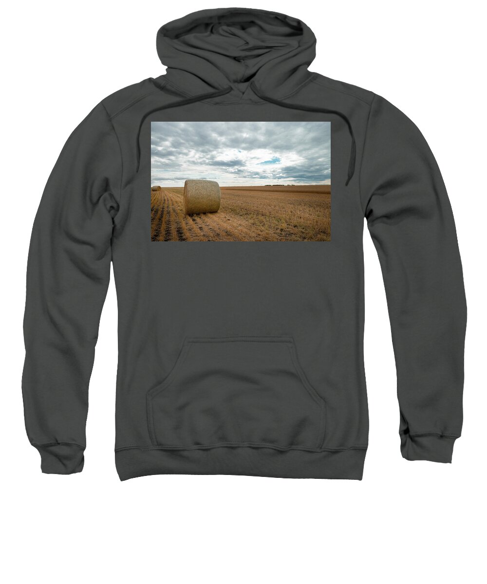 Harvest Sweatshirt featuring the photograph After the wheat harvest in Alberta by Karen Rispin