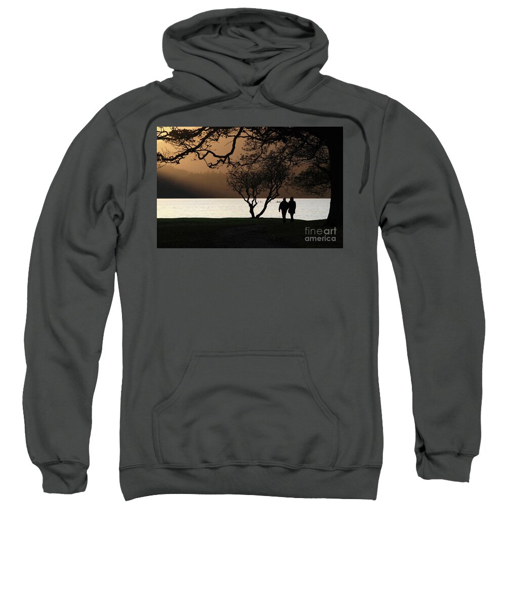 Couple Sweatshirt featuring the photograph Couple walking by Derwent Water, Keswick by Bryan Attewell