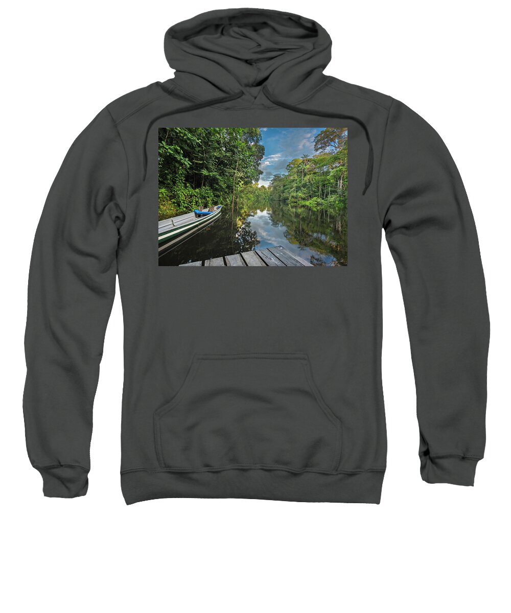 Amazon Sweatshirt featuring the photograph Cuyabeno river pontoon and canoe by Henri Leduc