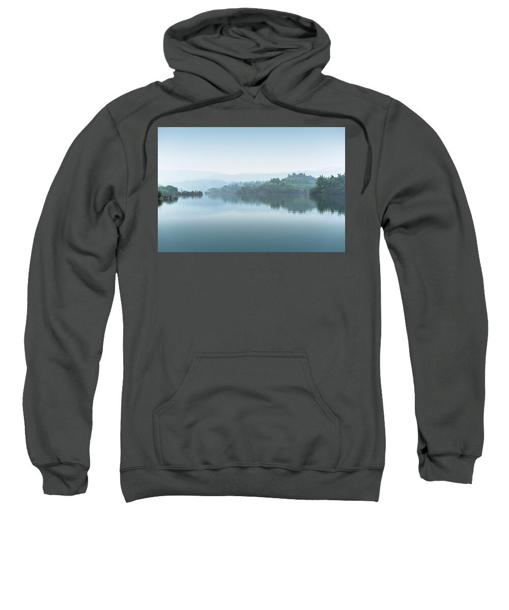 Lake Sweatshirt featuring the photograph Hills with trees in the fog from a lake in China by Philippe Lejeanvre