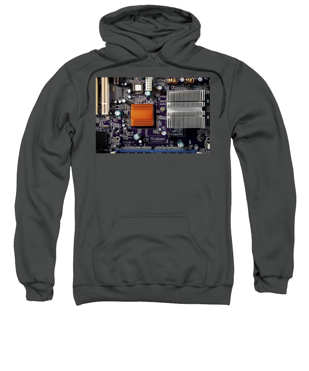 Computer Sweatshirt featuring the photograph Mainboard of a pc with electronic components. by Bernhard Schaffer