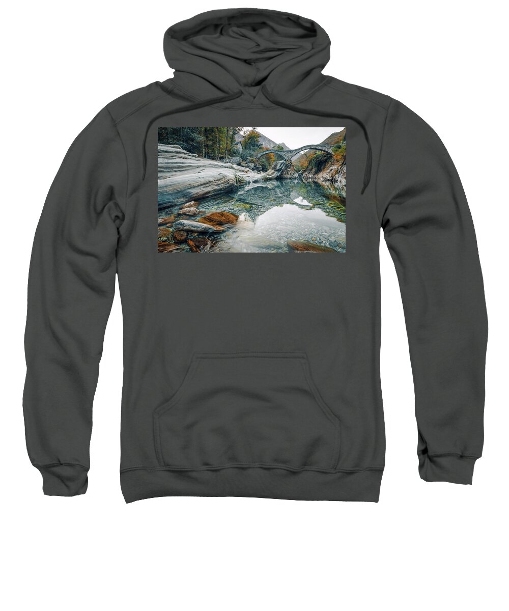 2018 Sweatshirt featuring the photograph Old stone bridge over crystal clear water by Benoit Bruchez