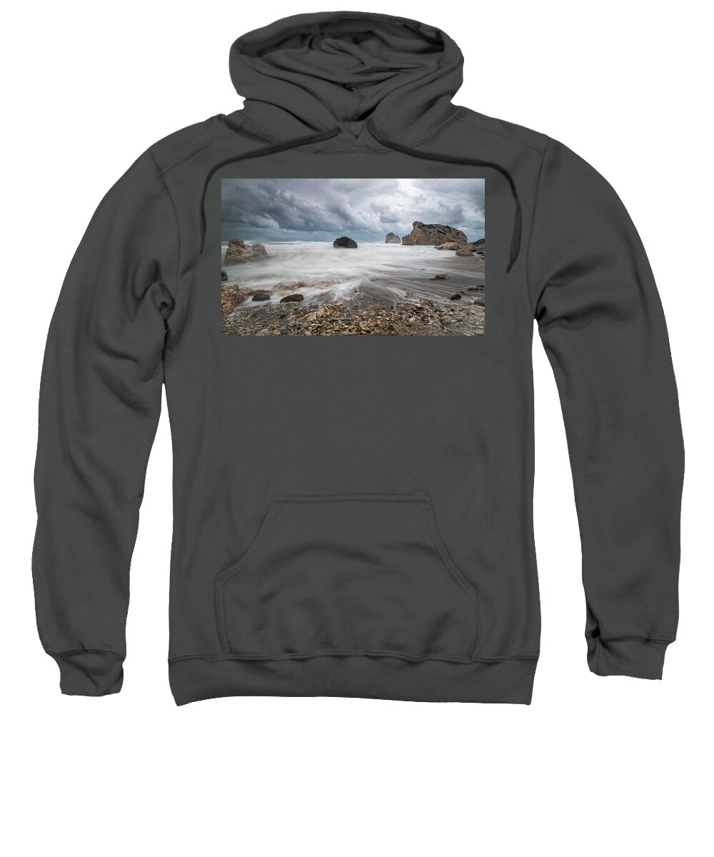 Seascape Sweatshirt featuring the photograph Seascape with windy waves during storm weather at the a rocky co by Michalakis Ppalis