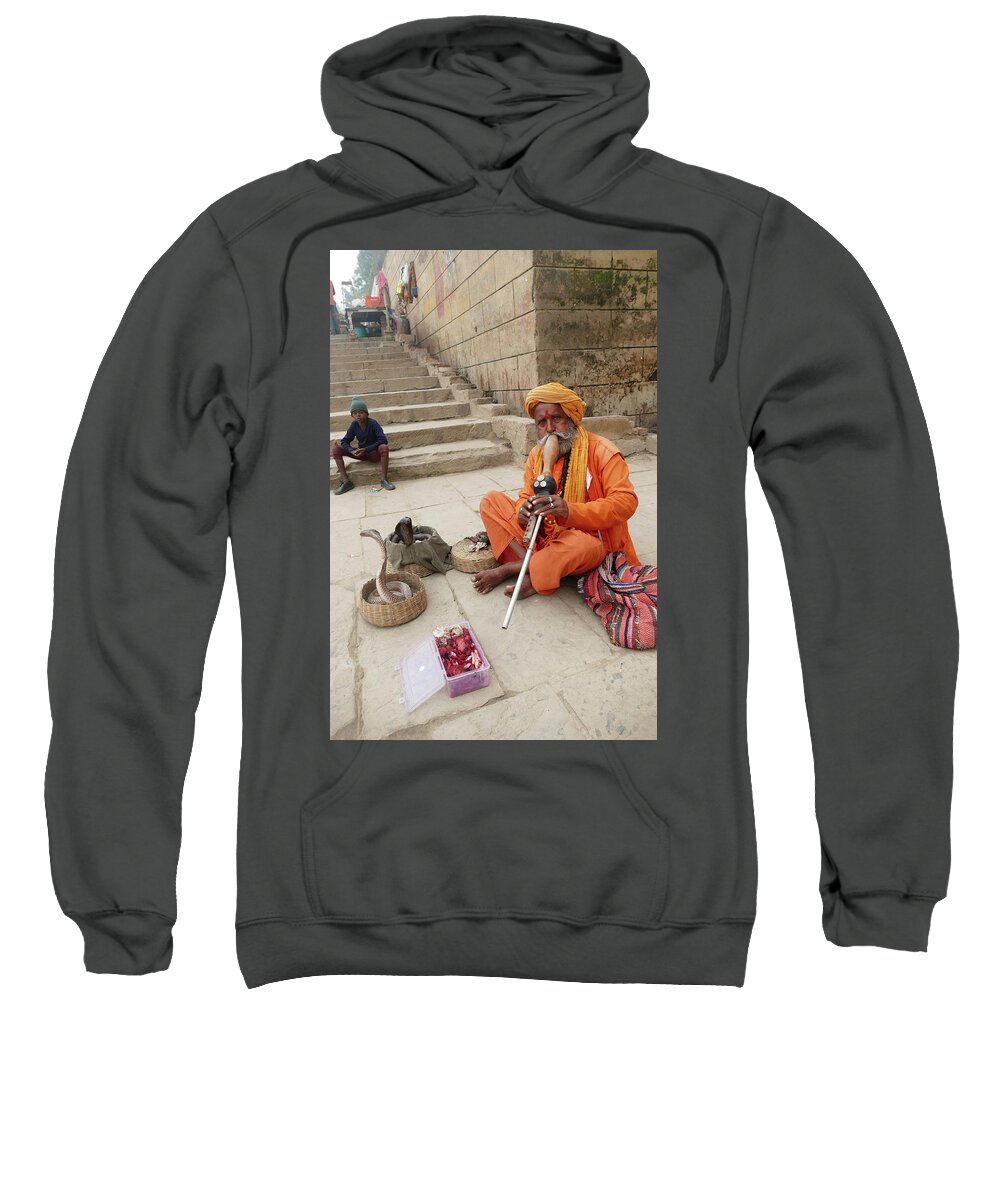 Scary Sweatshirt featuring the photograph Snake charmer with his snakes by Steve Estvanik