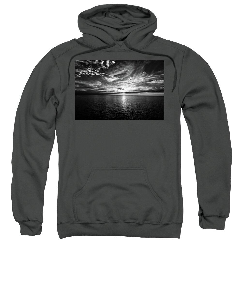 Sunset Sweatshirt featuring the photograph Sunset on the horizon at sea by Bernhard Schaffer