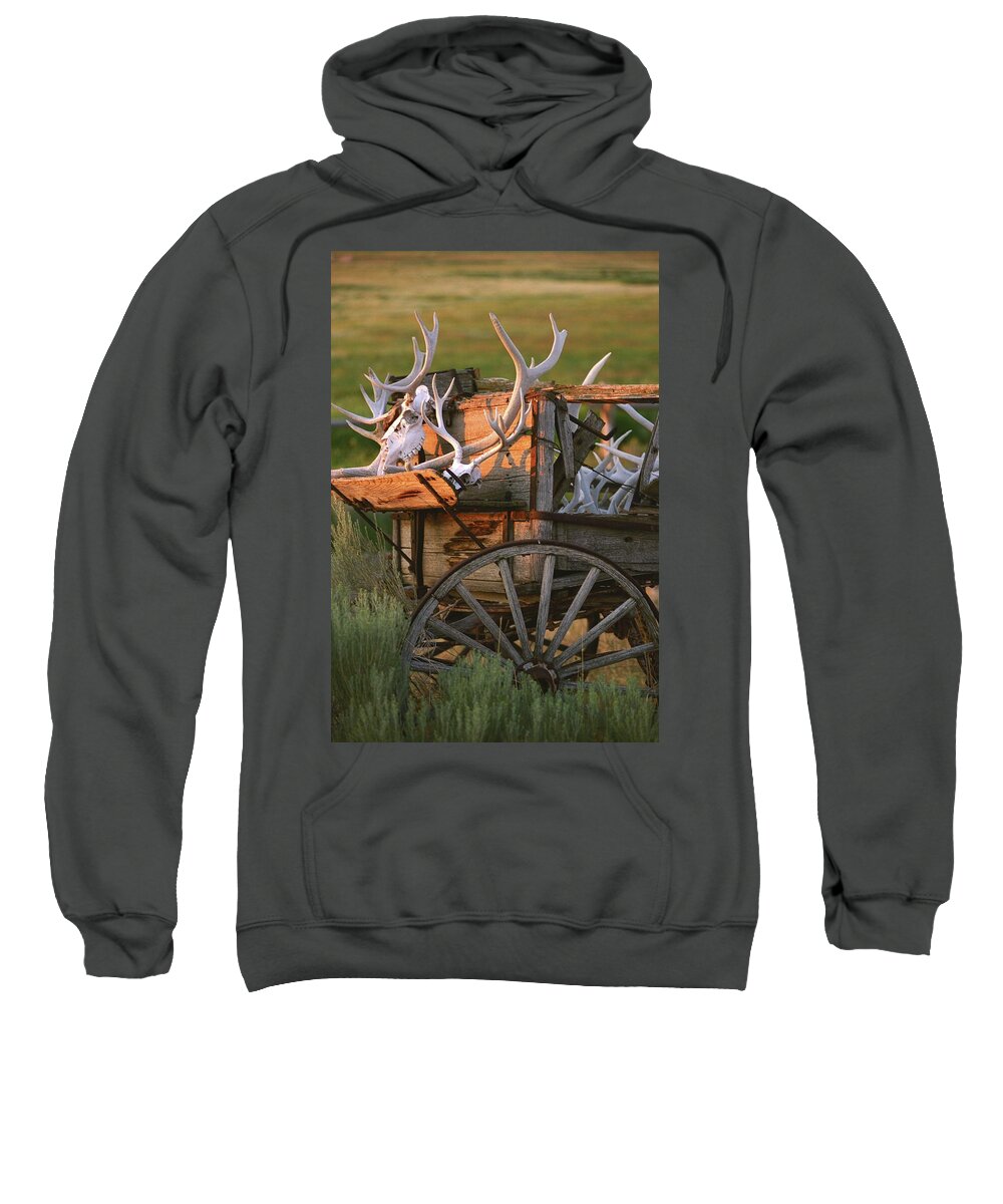 Legacies Sweatshirt featuring the photograph Legacies -Wagon Wheel and Antler Horns - Montana by Bonnie Colgan