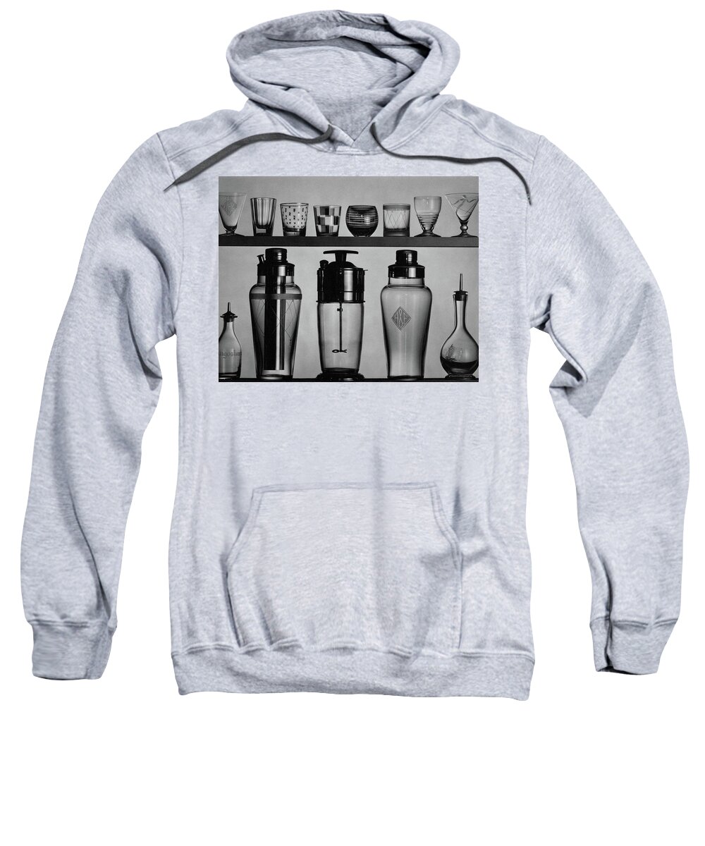 Accessories Sweatshirt featuring the photograph A Row Of Glasses On A Shelf by The 3