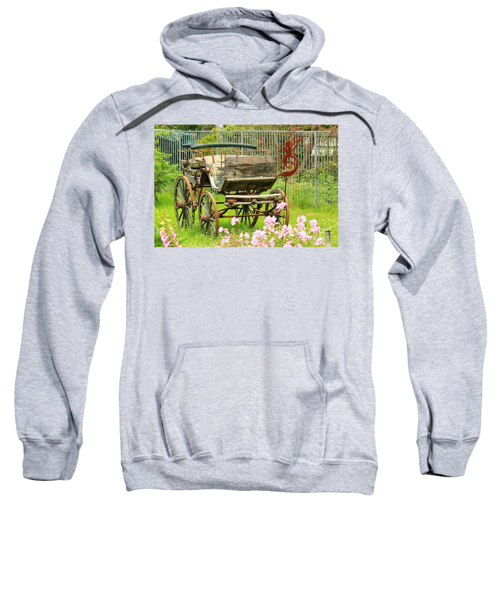 Aged Sweatshirt featuring the photograph Vintage horse carriage in a flower bed by Amanda Mohler