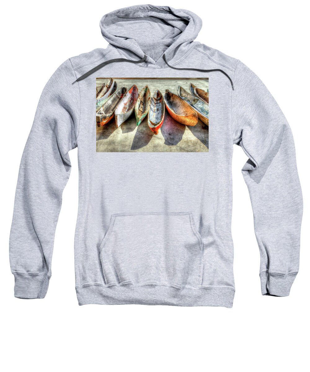 The Sweatshirt featuring the photograph Canoes by Debra and Dave Vanderlaan