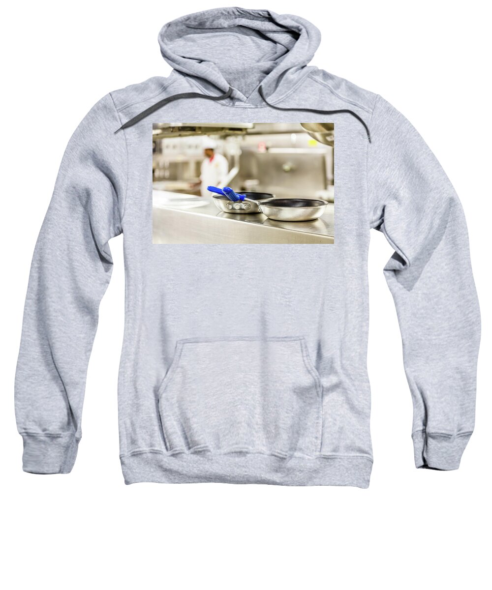 Kitchen Sweatshirt featuring the photograph Commercial Pans with Chef in Background by Darryl Brooks
