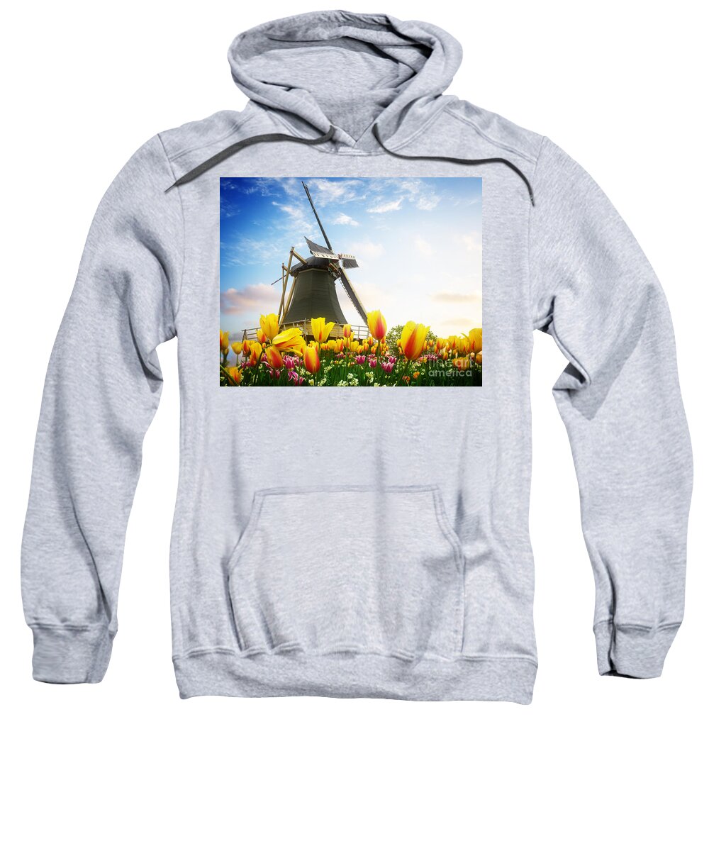 Netherlands Sweatshirt featuring the photograph One Dutch Windmill Over Tulips by Anastasy Yarmolovich