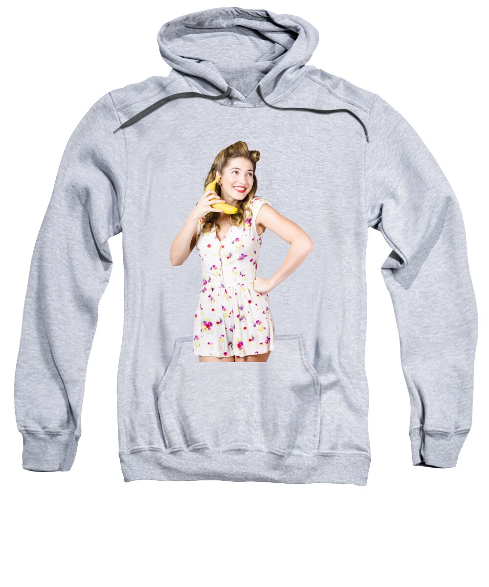 Fruit Sweatshirt featuring the photograph Retro pin up girl chatting on banana telephone by Jorgo Photography