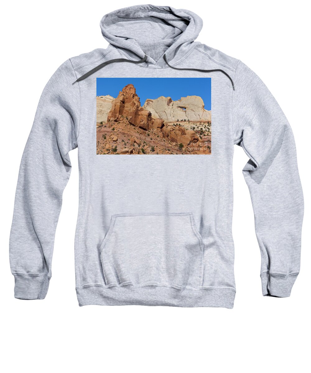 00559230 Sweatshirt featuring the photograph Sandstone Arch at Capitol Reef by Yva Momatiuk John Eastcott