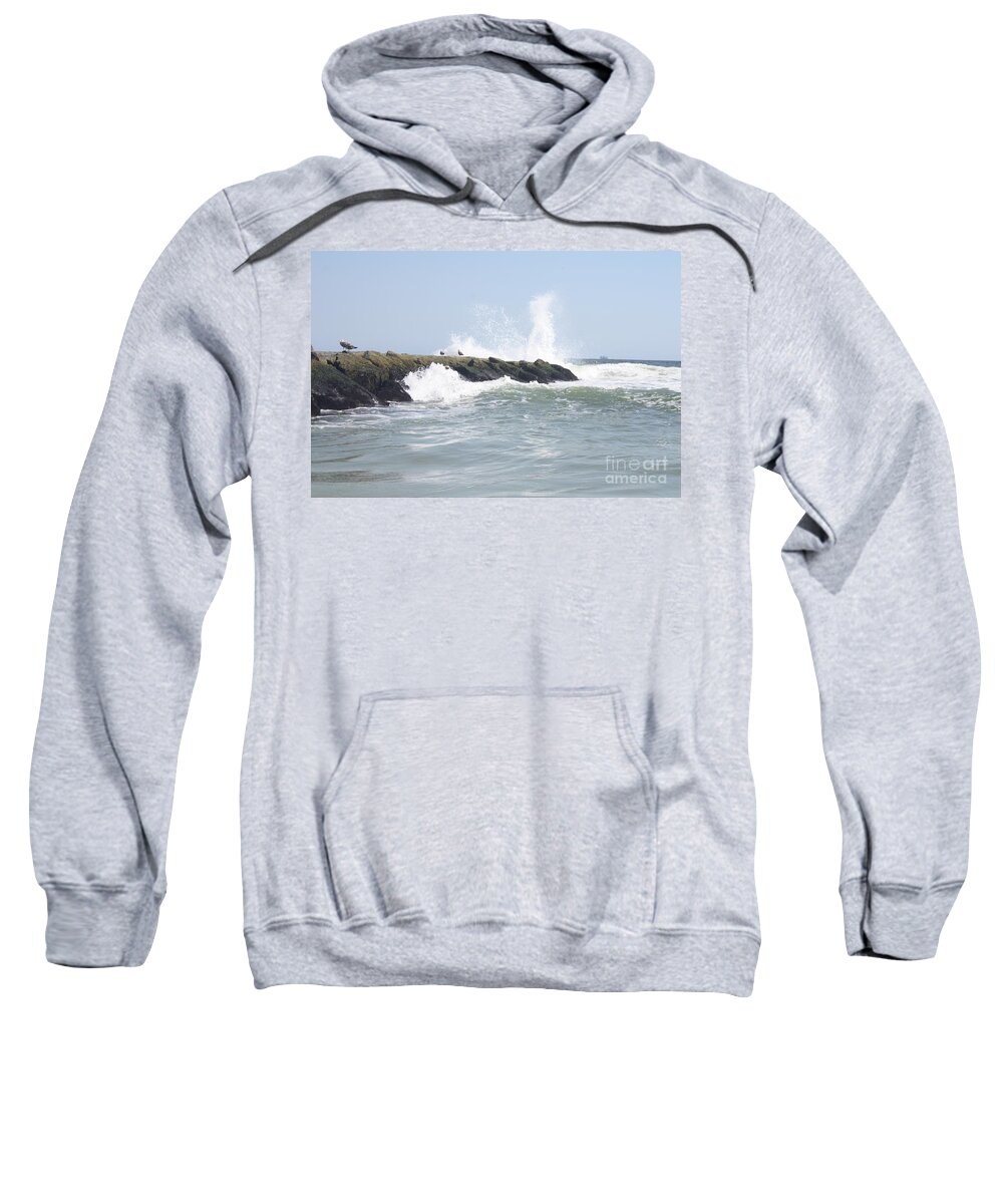 Waves Crashing Onto Long Beach Jetty Sweatshirt featuring the photograph Waves Crashing Onto Long Beach Jetty by John Telfer