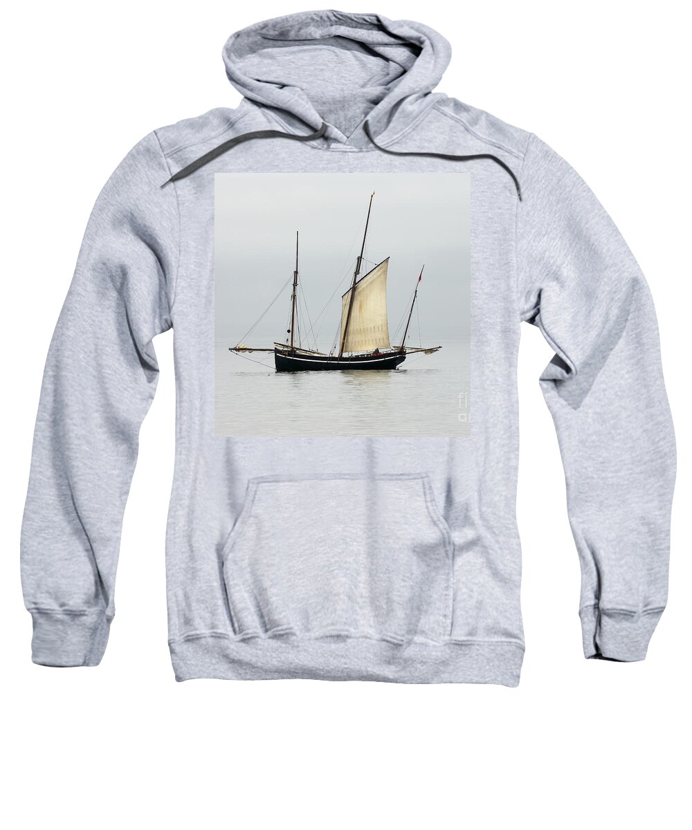 Lugger Sweatshirt featuring the photograph A Cornish Lugger becalmed in Mounts Bay, Cornwall. by Tony Mills