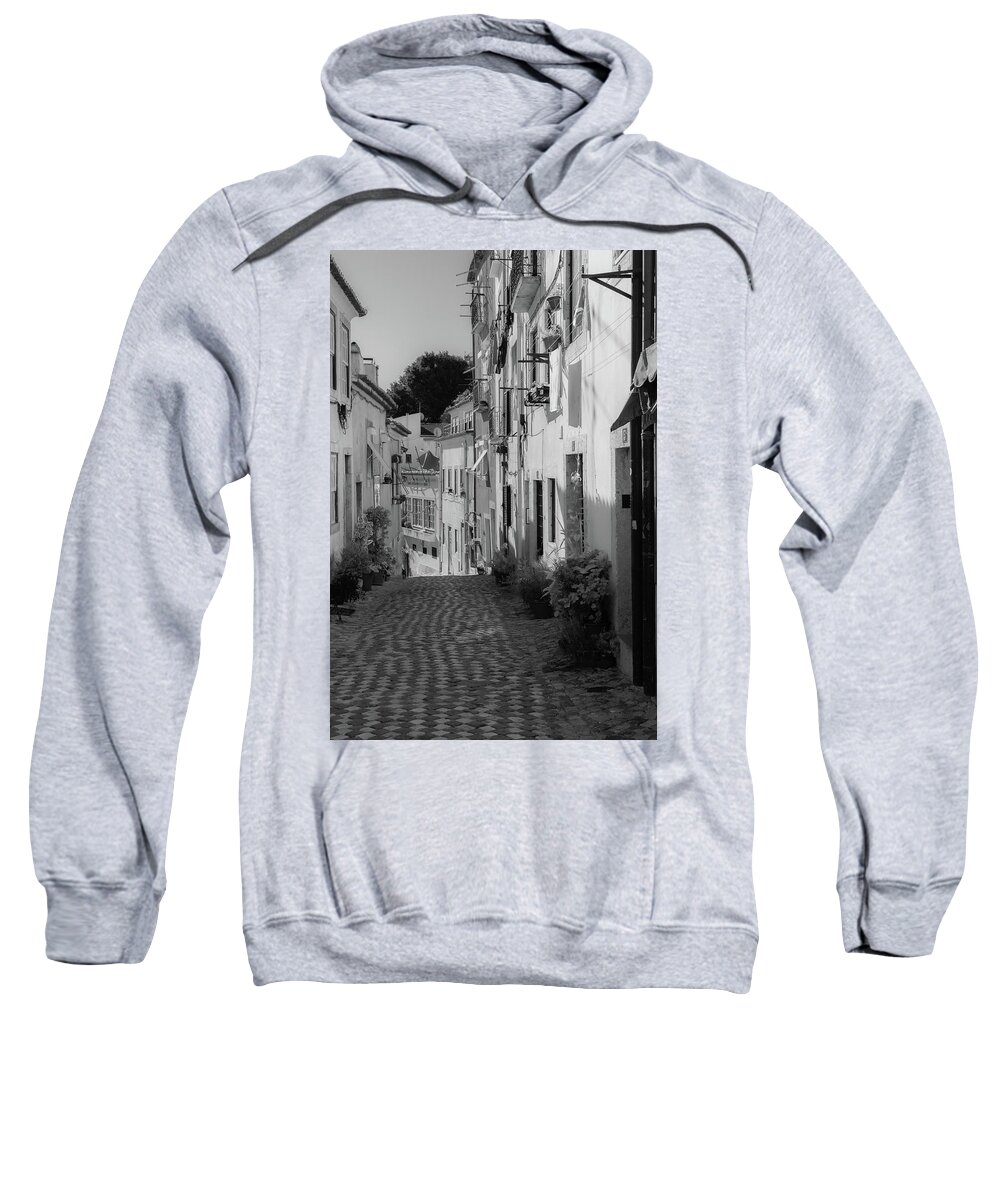 Balcony Sweatshirt featuring the photograph Cobblestone Streets of Lisbon's Old Quarter by Christina McGoran