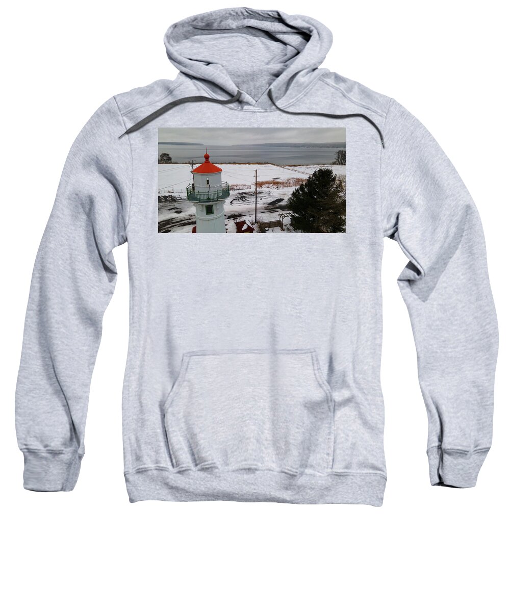 Lighthouse Sweatshirt featuring the photograph Grand Island Harbor Lighthouse in Munising Michigan during winter by Eldon McGraw