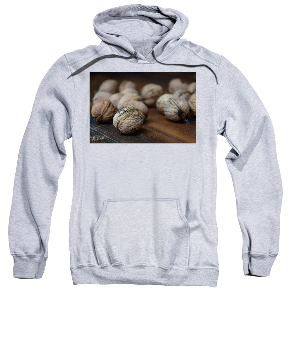 Nuts Sweatshirt featuring the photograph Nuts on a wooden table by Martin Vorel Minimalist Photography
