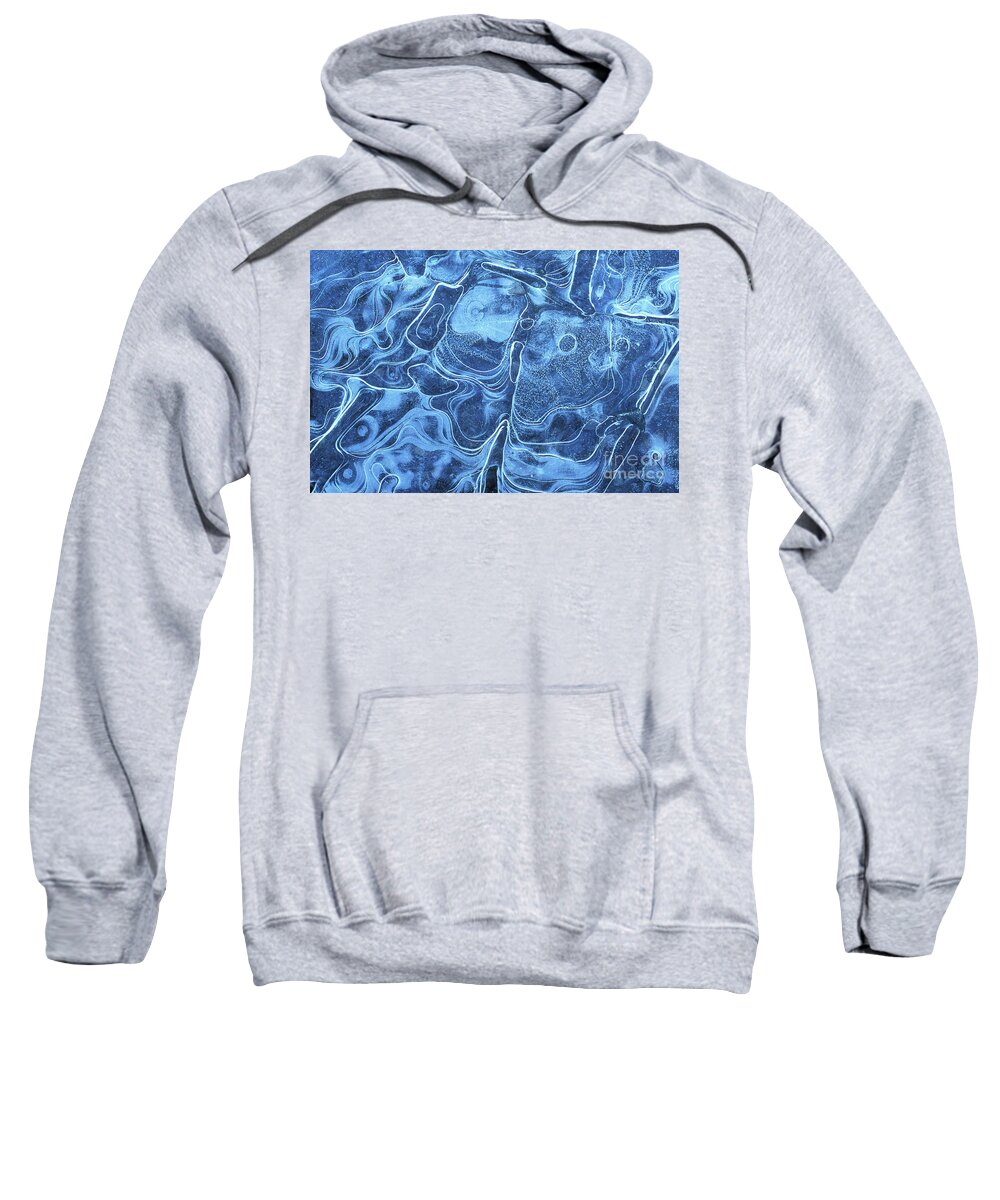 Ice Pattern Sweatshirt featuring the photograph Patterns in the ice of a frozen lake by Neale And Judith Clark