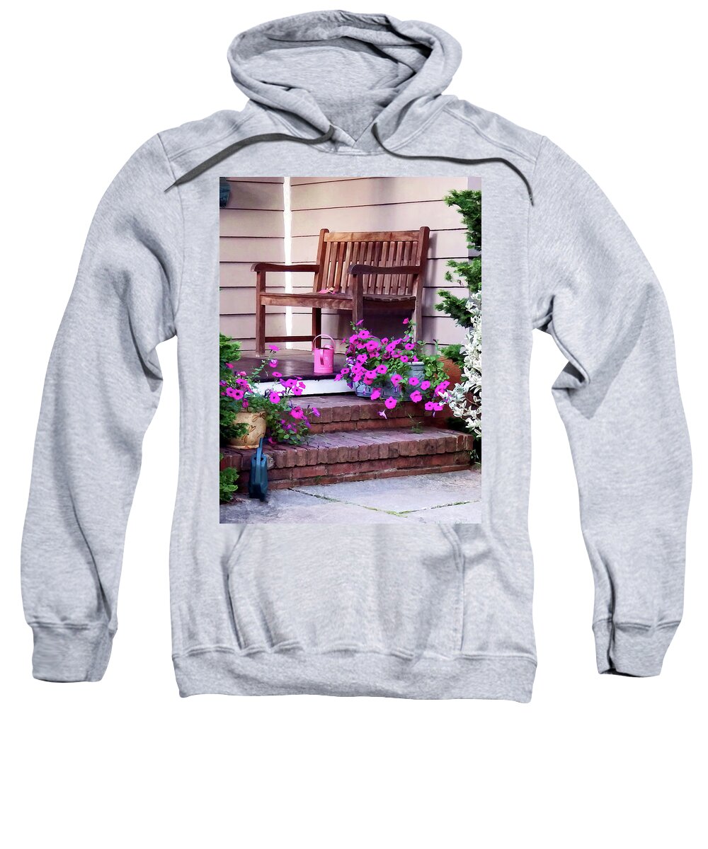 Petunia Sweatshirt featuring the photograph Pink Petunias and Watering Cans by Susan Savad