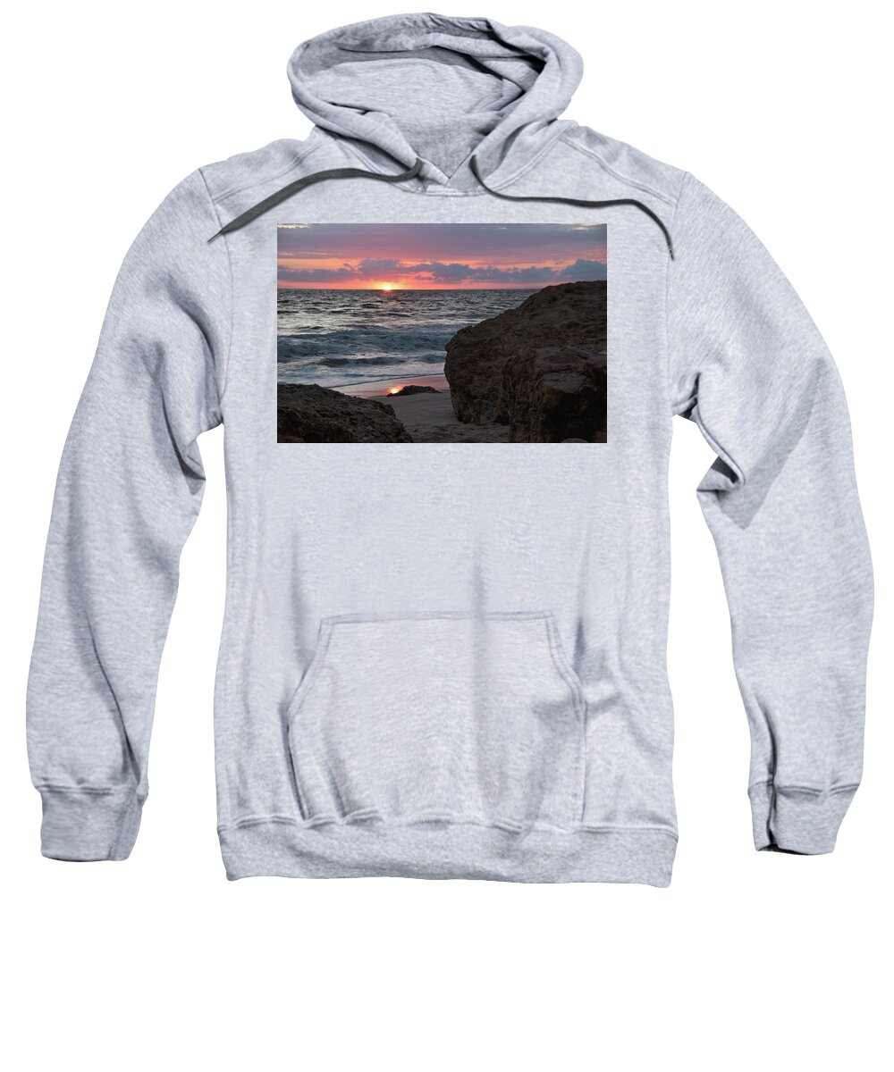 Beach Sweatshirt featuring the photograph Setting Sun Dipping Below the Horizon by Matthew DeGrushe