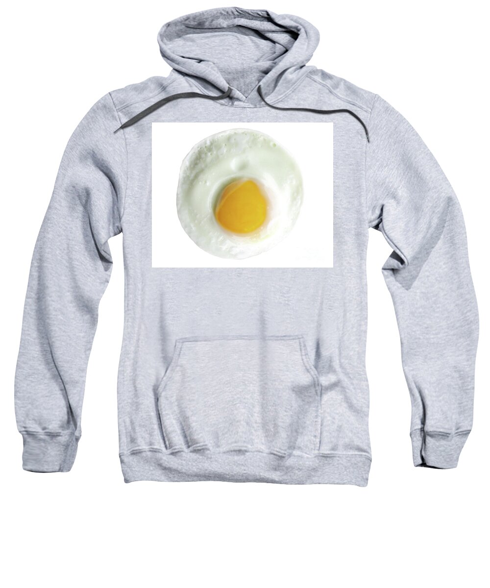 Sunny Side Sweatshirt featuring the photograph Single egg, sunny side up, isolated on white, perfect yolk in ce by Pete Klinger