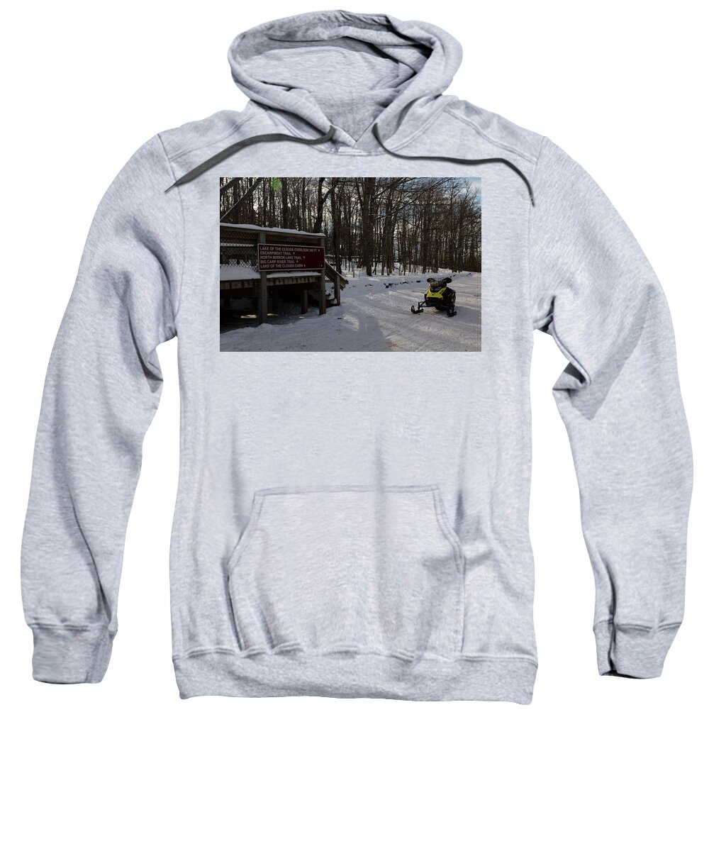  Sweatshirt featuring the photograph Snowmobile at entrance to Lake of the Clouds in Michigan. by Eldon McGraw