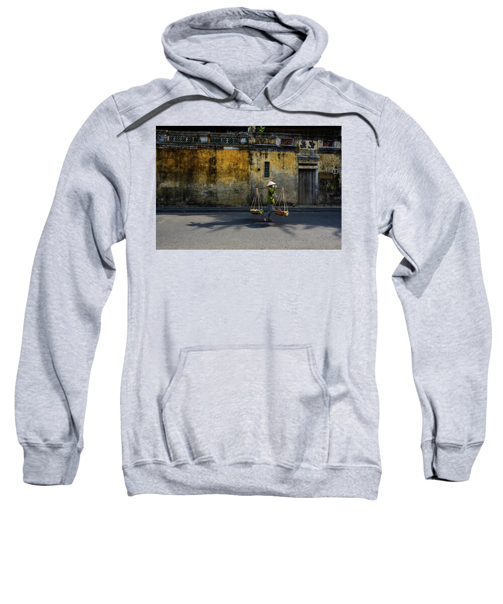 Awesome Sweatshirt featuring the photograph Woman selling street on Hoi An ancient town by Khanh Bui Phu
