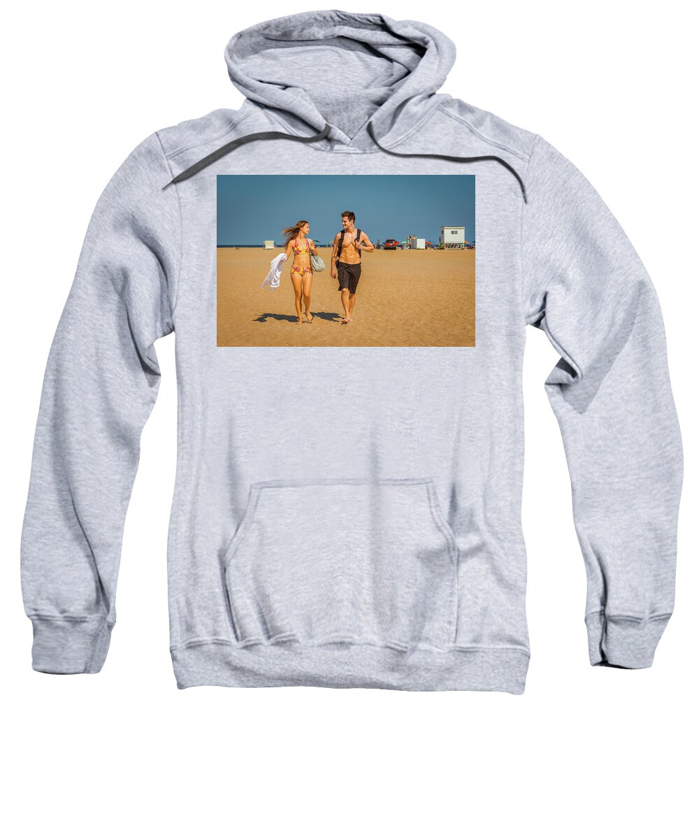 Young Sweatshirt featuring the photograph Young American Couple traveling, relaxing on the beach in New Je by Alexander Image