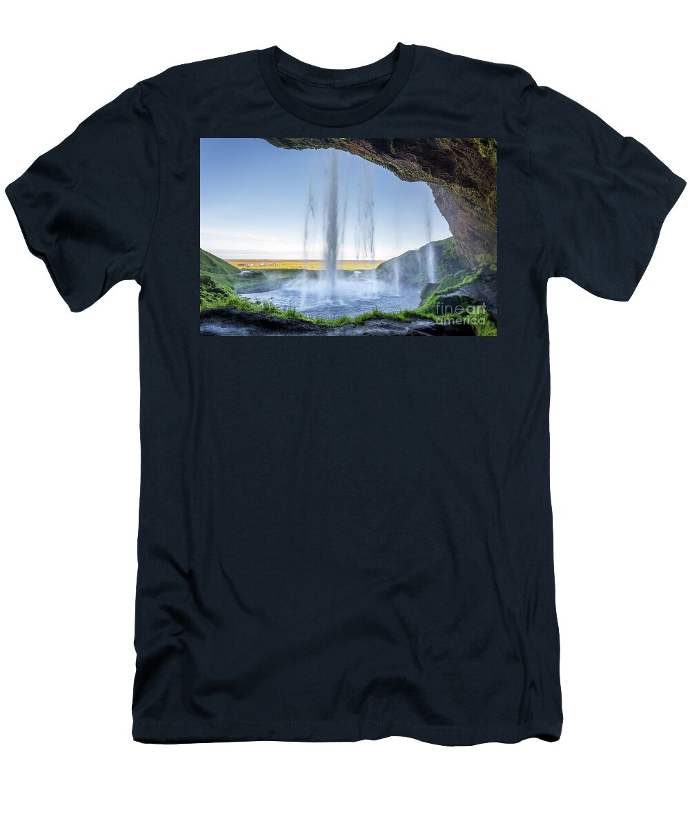Iceland T-Shirt featuring the photograph Walking behind Seljalandsfoss waterfall, Iceland by Delphimages Photo Creations