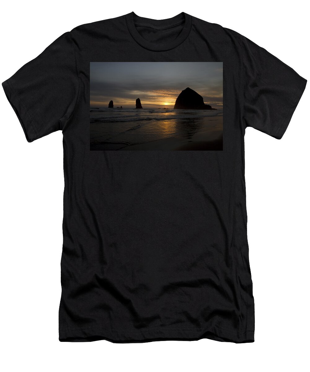 Sunset T-Shirt featuring the photograph Sunset over Haystack Rock in Cannon Beach #1 by David Gn