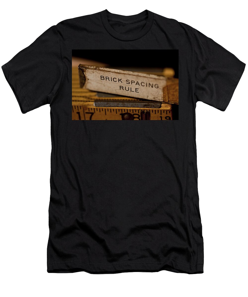 Rusty T-Shirt featuring the photograph Brick Mason's Rule by Wilma Birdwell