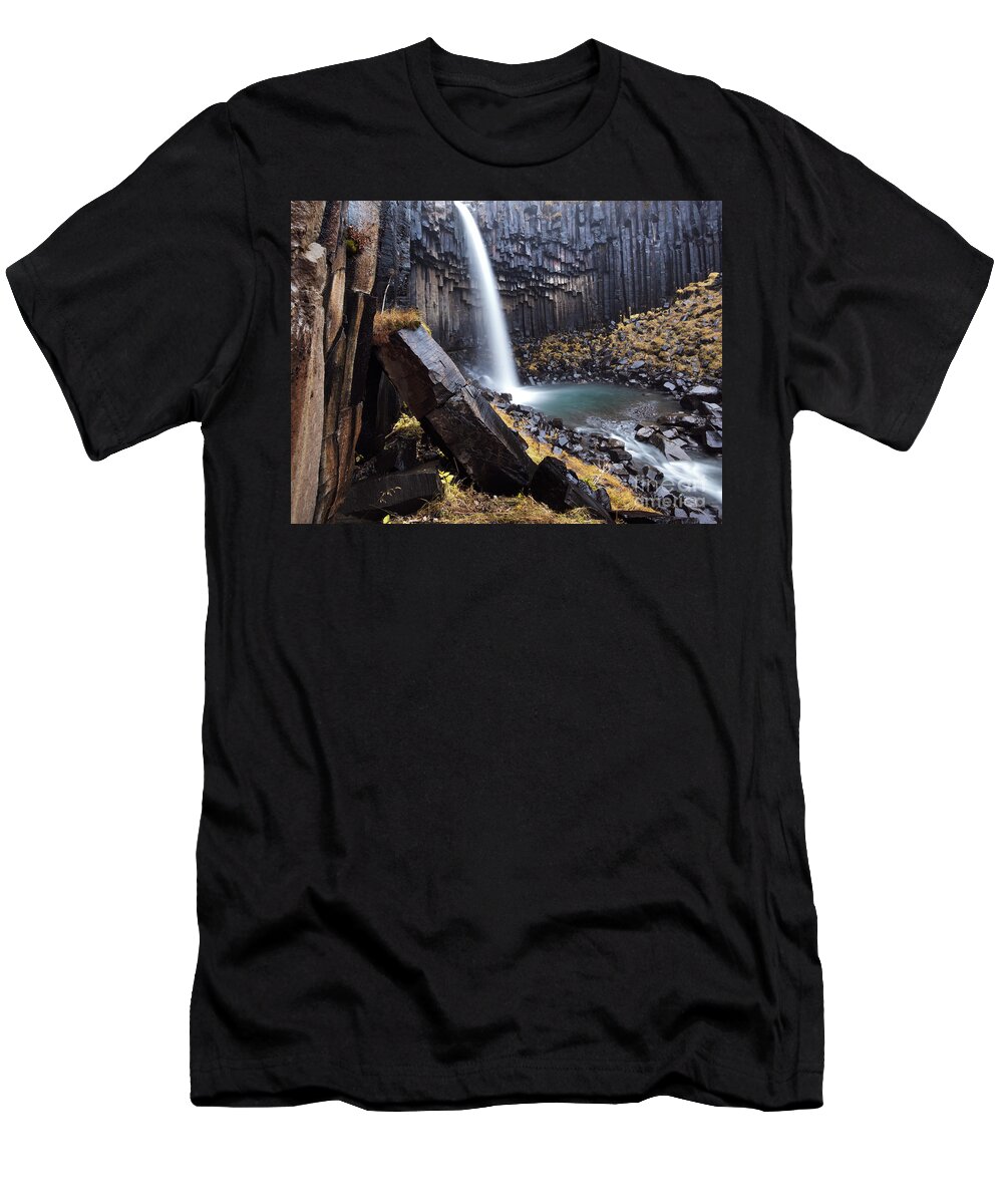 Waterfall T-Shirt featuring the photograph Flowing through basalt rocks II by Matteo Colombo
